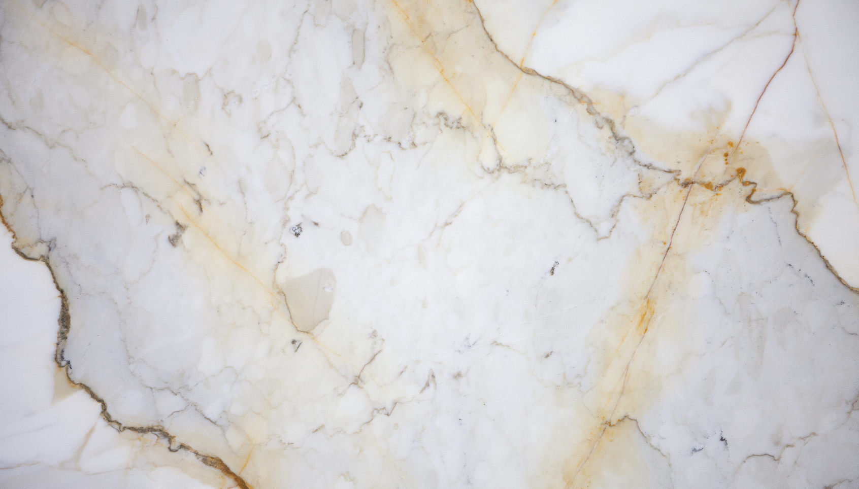 WHY DOES WHITE MARBLE TURN YELLOW?